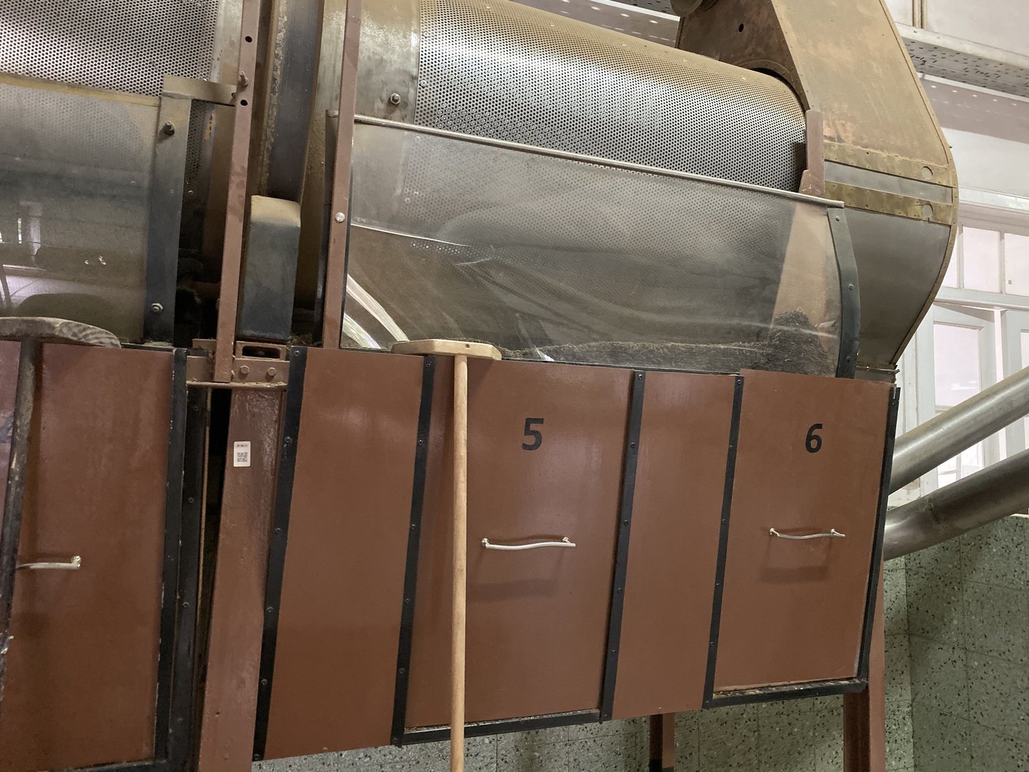 Vintage rotating drum sorters numbered five and six inside the Cha Gorreana tea factory